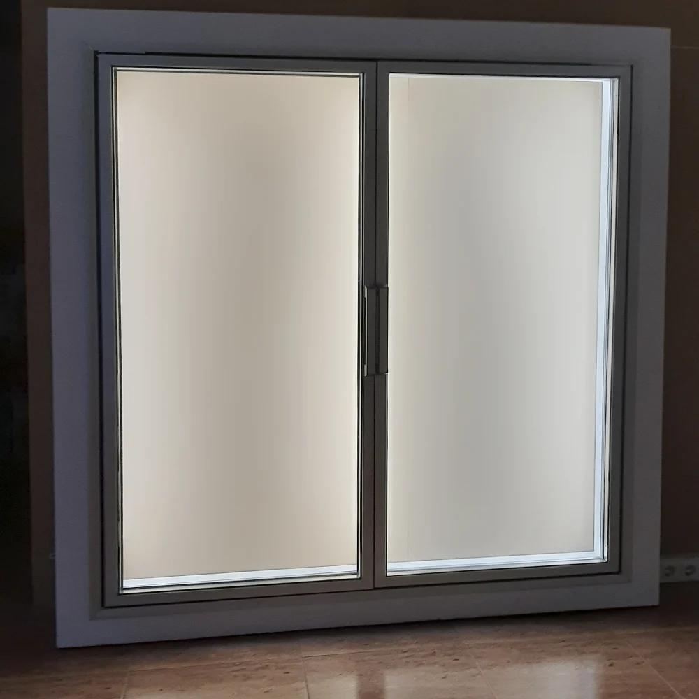 Refrigerated cabinet door lit with LED strip lights