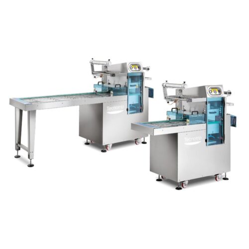 Tecnotrip TSB-AC-175 continuous automatic tray sealer (left, long loading line) next to the TSB-AC-70